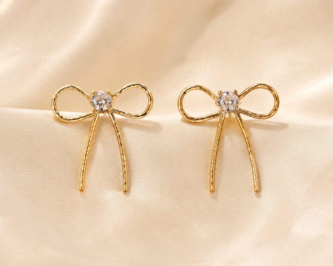Golden bow earrings