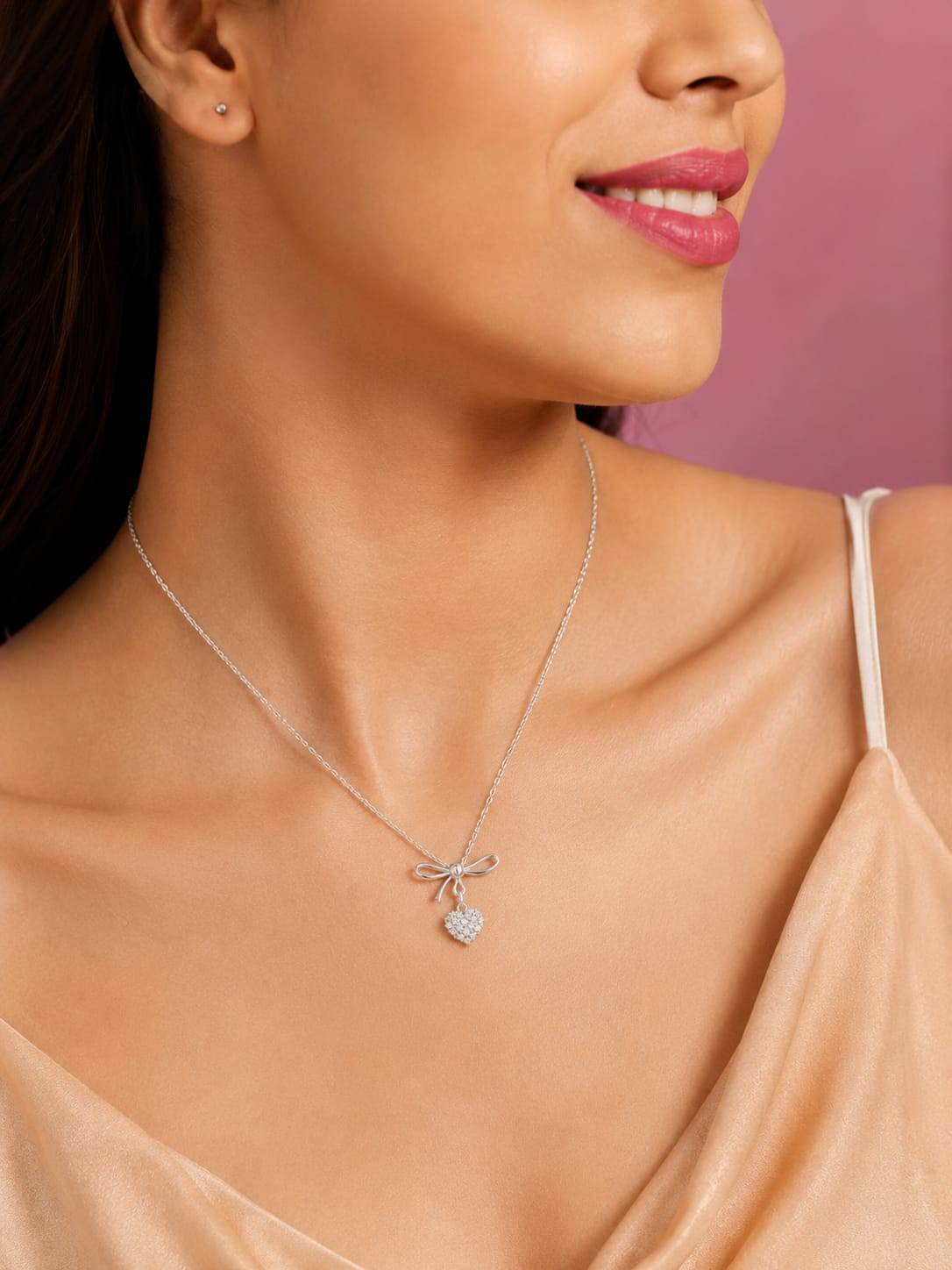 Silver heart bow pendant necklace