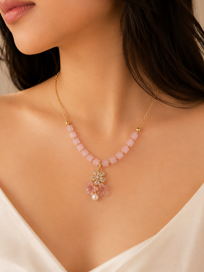 Pink beaded floral pendant necklace