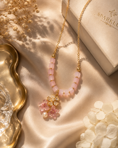 Pink beaded floral pendant necklace