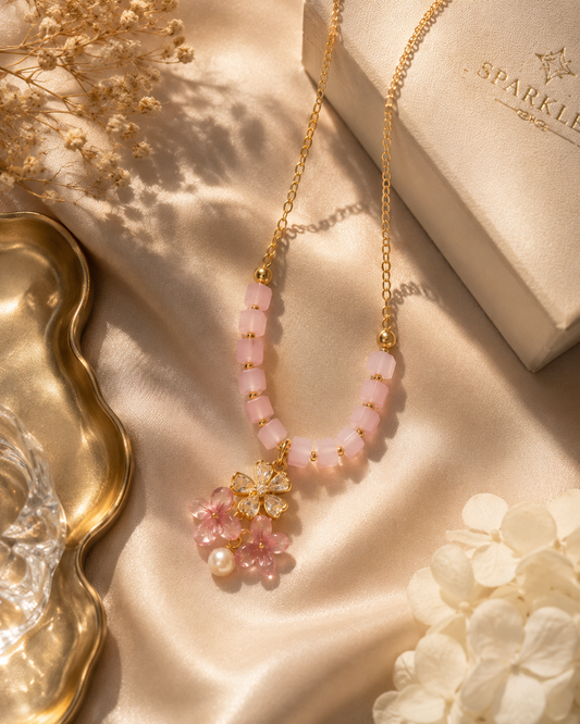 Pink beaded floral pendant necklace