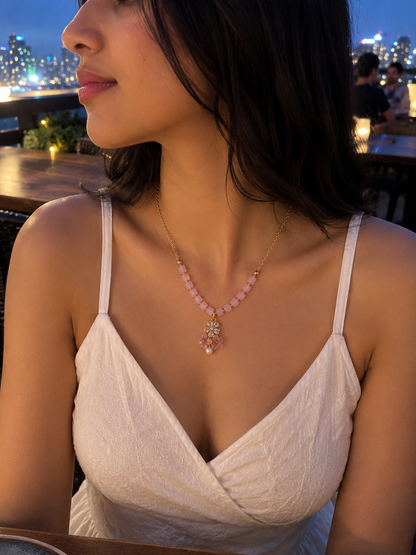Pink beaded floral pendant necklace
